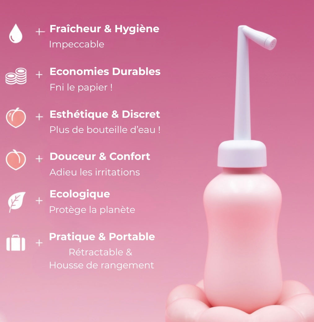 Douchette nomade intime rose surélevée, embout pulvérisateur blanc et base