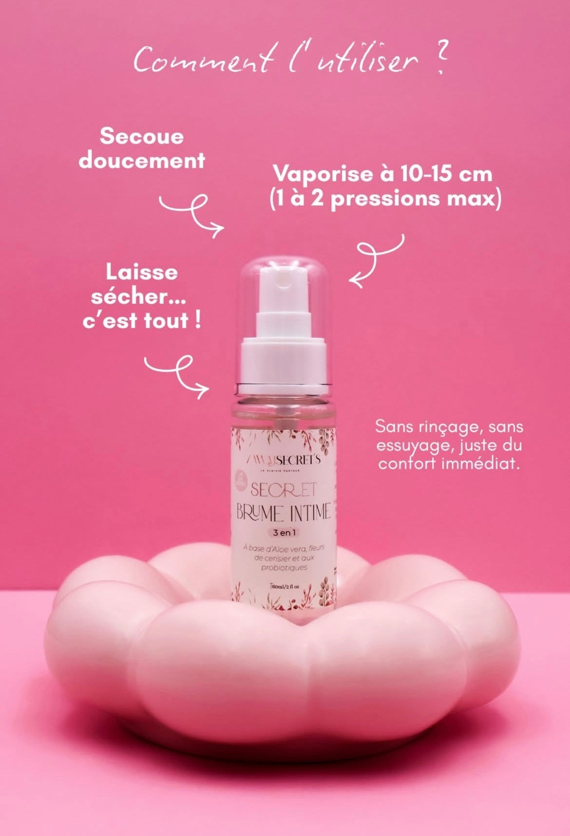 Flacon Brume Intime 3en1 sur un coussin en forme de cœur, indications d’utilisation visibles.