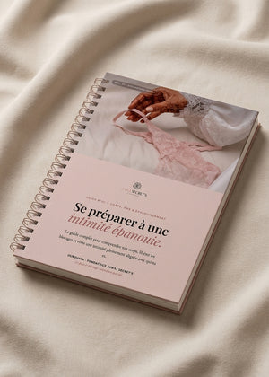 Livre à spirale, couverture blanche, titre « intimité épanouie ».