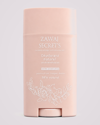 Déodorant Les Essentielles — produit réel sur fond gris perle rosé